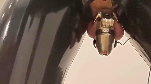 Rubber Puppy Cums Hands Free In Chastity