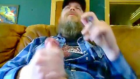 Bearded Biker Smoking and Jacking